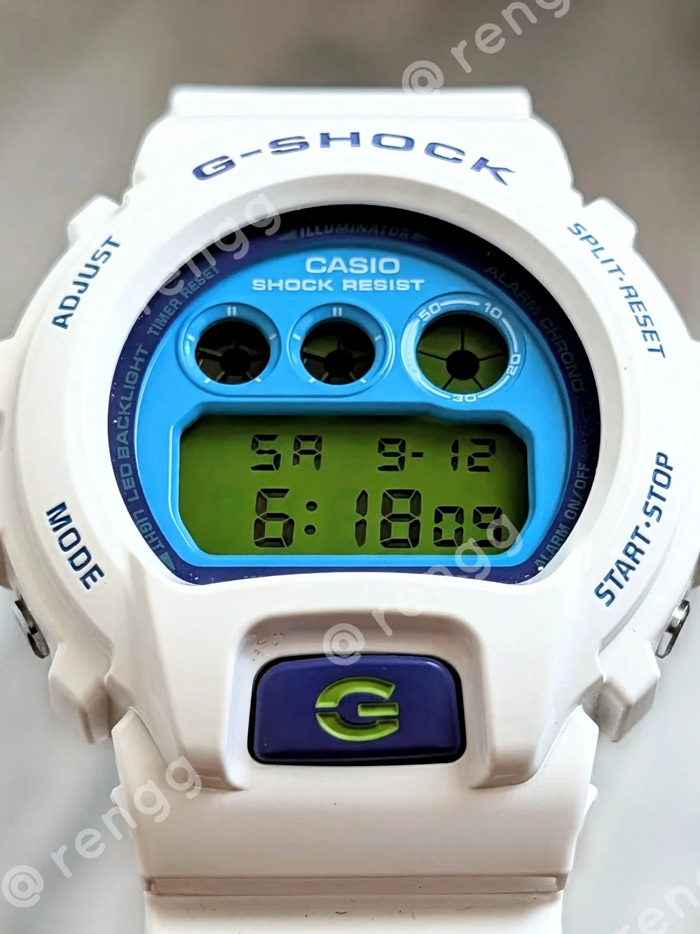 G-Shock White Resin Digital Watch with Blue Dial and Green Accents